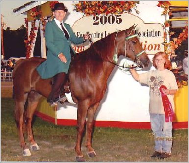 Lads Red Rebecca Z. & Laura Atkinson taking Reserve honors in the English Pleasure Championship at the 2005 Show & Celebration
