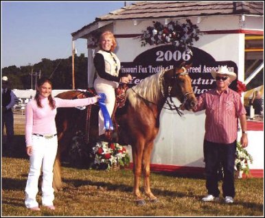Image's Smoky Topaz Z. & Brenda Zeigenbein winning first place at the 2006 Spring Show
